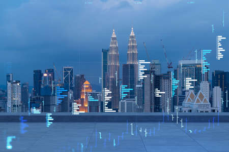 Rooftop with concrete terrace kuala lumpur night skyline forecasting and business modeling of financial markets hologram digital charts city downtown double exposure