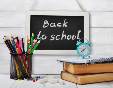 Back to school concept on wooden background