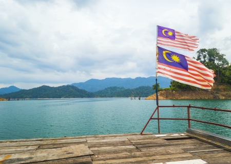 Flag with mountain and island background