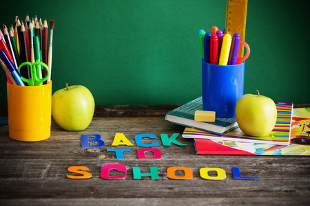 School stationary on wooden table