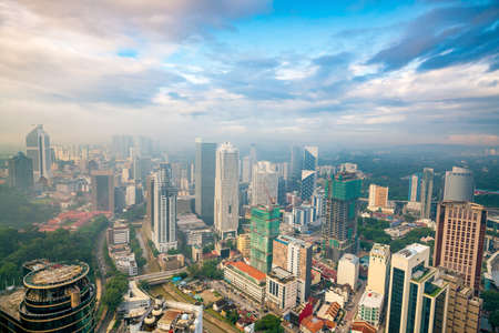 Downtown kuala lumpur skyline with blue sky in malaysia