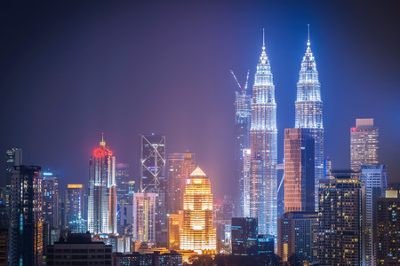 Cityscape of kuala lumpur city skyline at night in malaysia